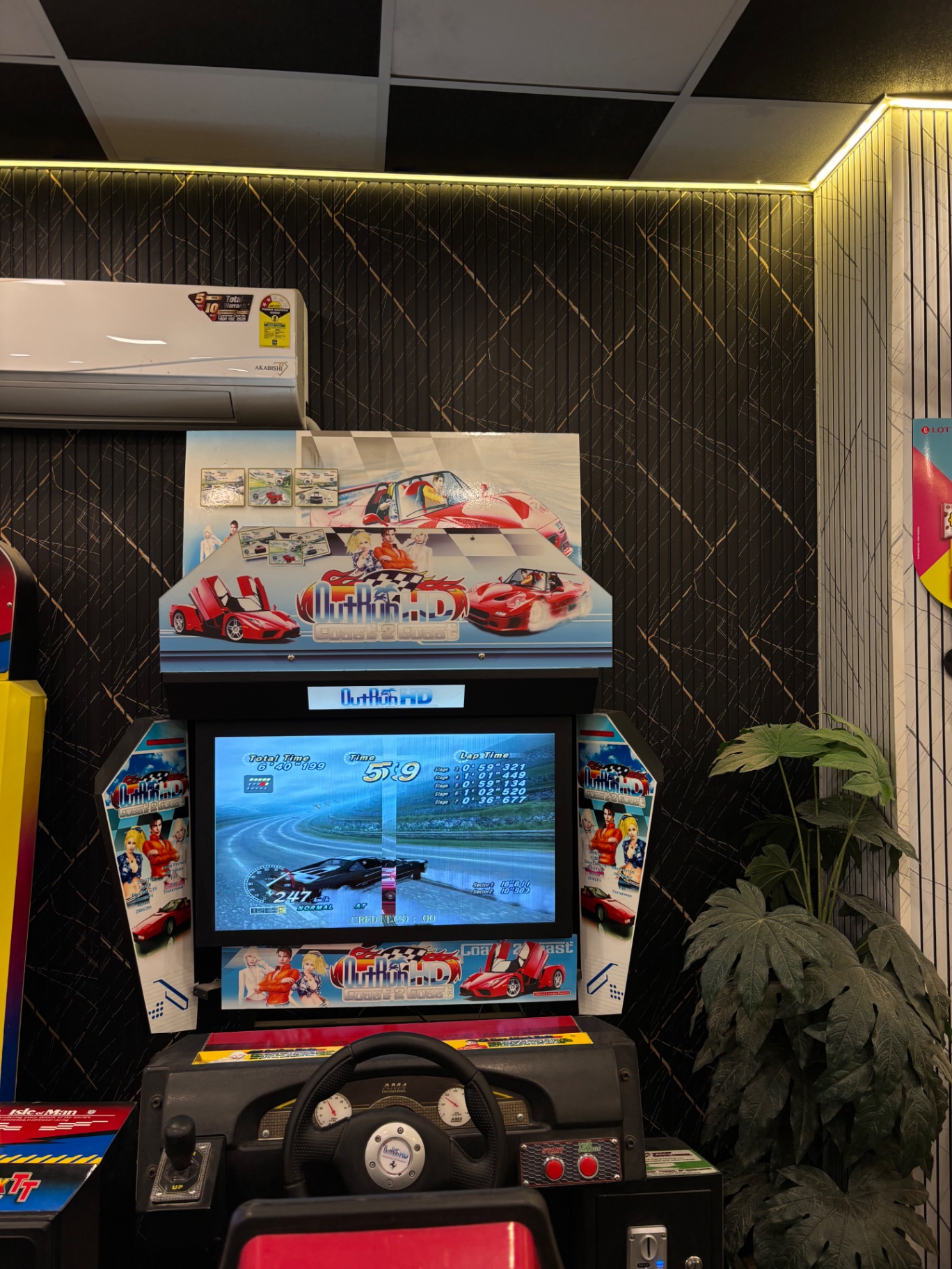 OutRun HD arcade racing cabinet