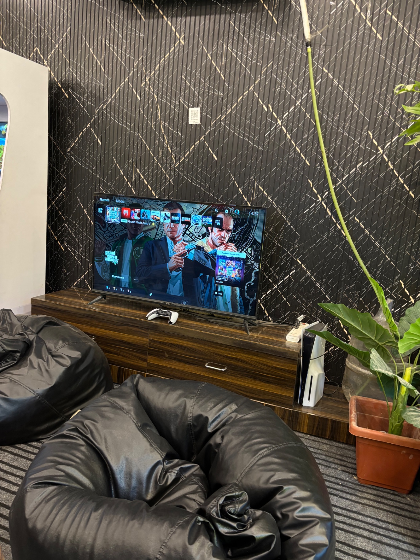 PlayStation 5 gaming lounge with bean bags